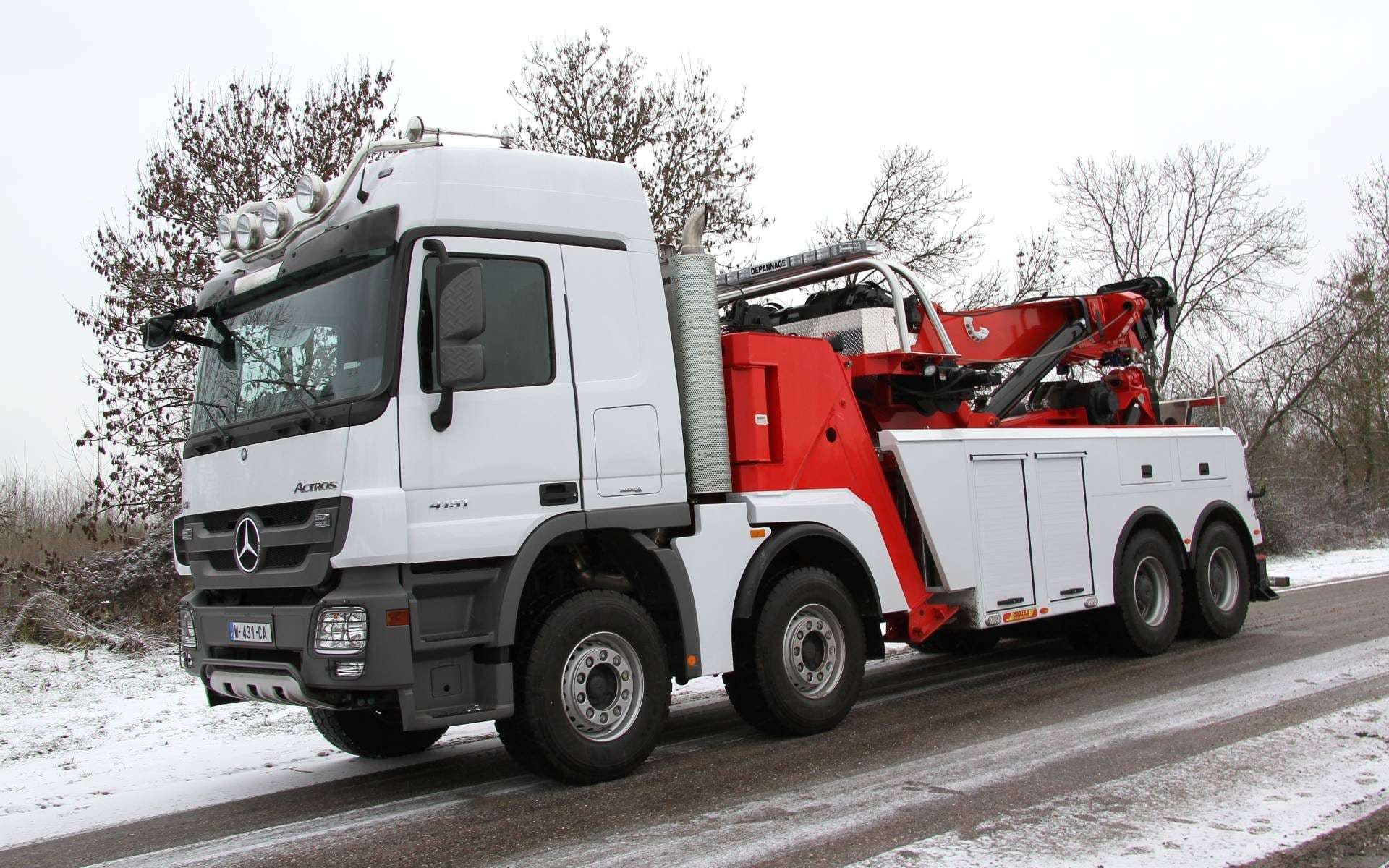 Фото эвакуатора для перевозки грузовиков на жесткой сцепке